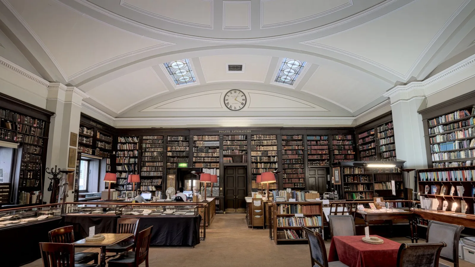 Explore the elegant and historic interior of a classic library in Manchester, England. Perfect for literature enthusiasts.