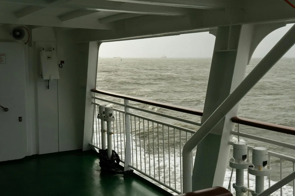 Scenic view from a ferry deck, overlooking the North Sea near Borkum, Germany.